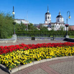 Square near embankment of the river Tom'. On background view Christian cathedral. Russia. Siberia.Tomsk.